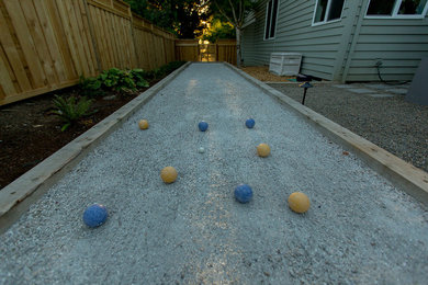 Inspiration for a large contemporary partial sun backyard gravel outdoor sport court in Portland.