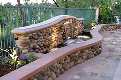 Design ideas for a traditional garden in Orange County.