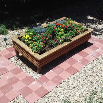 Checkered Paver Walkway With Raised Bed