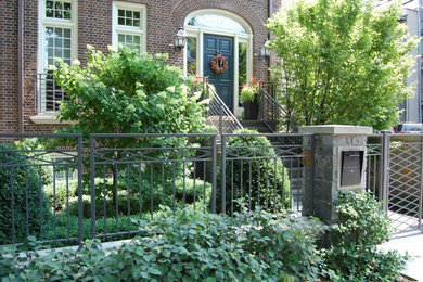 Photo of a small traditional full sun front yard stone landscaping in Chicago for spring.