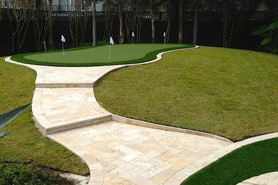 Design ideas for a small contemporary backyard landscaping in Orlando.