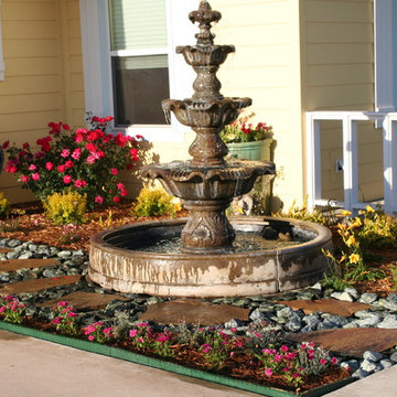 Colorful Fountain Garden with Rock Walkway