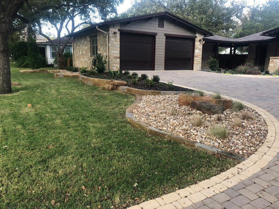 Combination of mulch and Colorado River Rocks, Moss Boulders & Sandstone borders