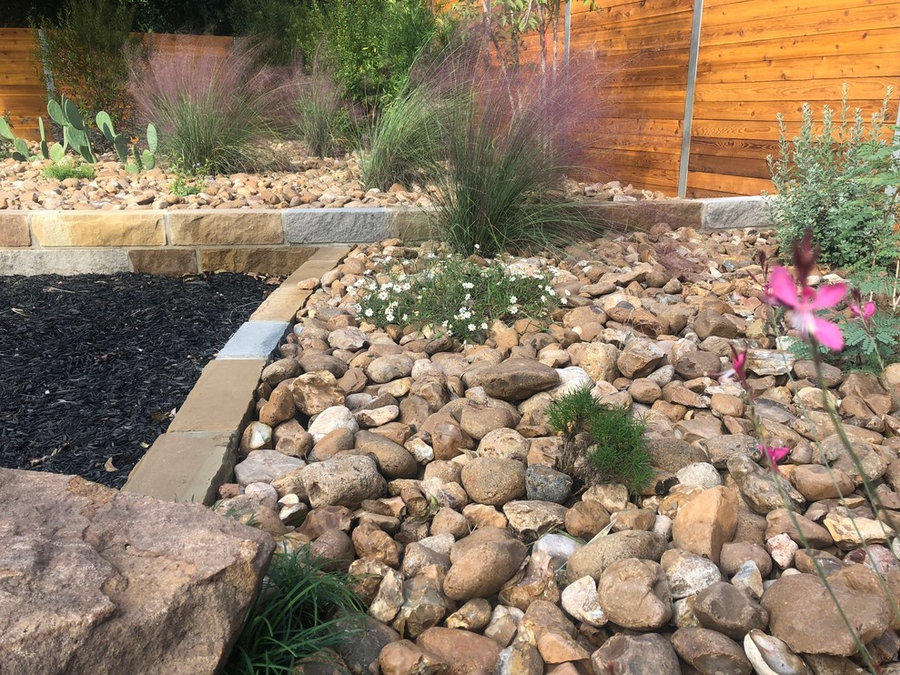 Combination of Mulch, Sandstone beds w/ Colorado River Rock