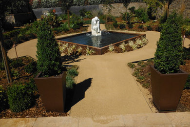 Photo of a large contemporary full sun front yard stone landscaping in San Francisco.