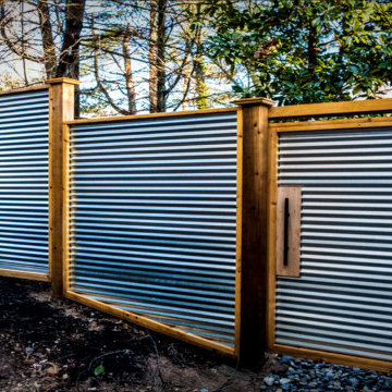 Corrugated metal fence