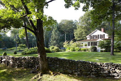 Design ideas for a farmhouse landscaping in New York.