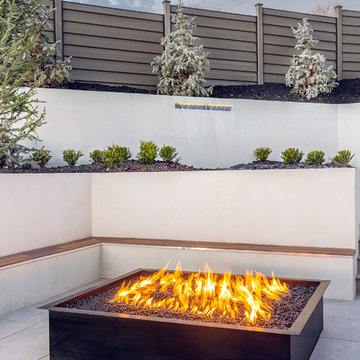 Modern Water Fall And Fire Pit With Seating