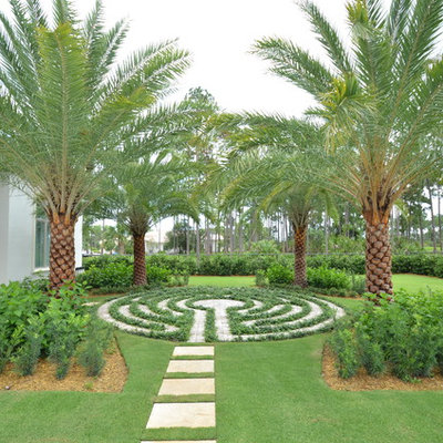 Photo of a tropical backyard landscaping in Miami.