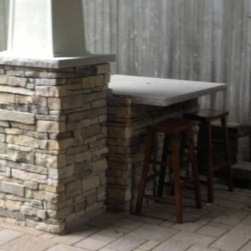 Covered Patio with Fireplace and Grill