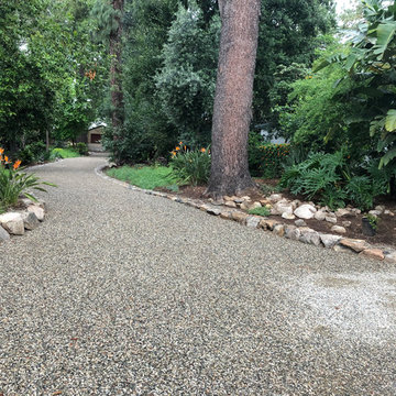 Cracked Concrete, converted to a Stabilized & Eco-Friendly Gravel Driveway..