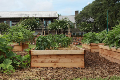 This is an example of a mulch vegetable garden landscape in Atlanta.