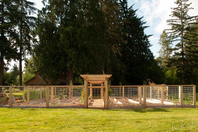 This is an example of a rustic vegetable garden landscape in Seattle.