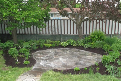 Design ideas for a rustic backyard landscaping in Ottawa.