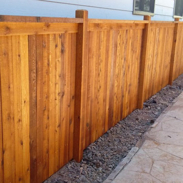 Custom cedar fence stained with Sikkens Natural