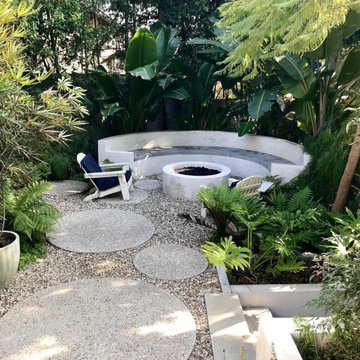 Custom Fire pit, paving and tropical planting