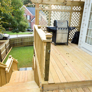 Deck with stairs leading to backyard