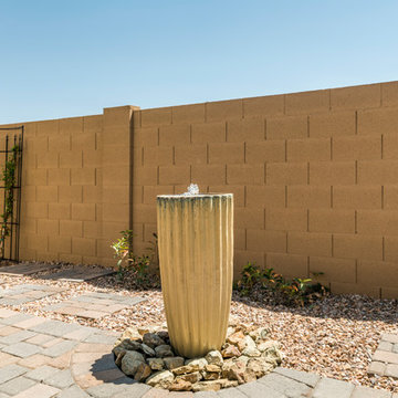 Desert Landscape with Raised Paver Patio and Vanishing Pottery Fountain