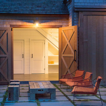 Detail of Cape Cod Barn Doors and Patio at Dusk