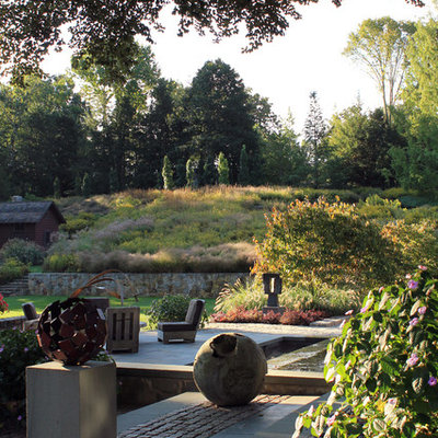 Photo of a traditional backyard landscaping in New York.