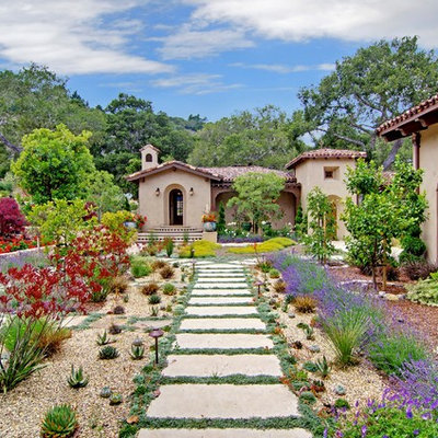 Inspiration for a large mediterranean full sun courtyard stone landscaping in San Francisco.