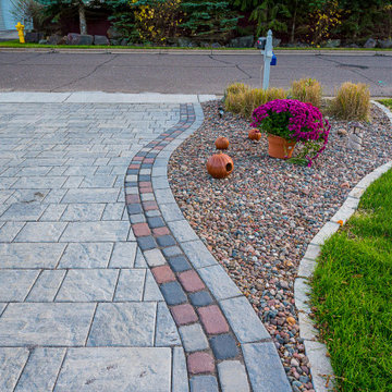 Driveway Makeover-Paver edged planting