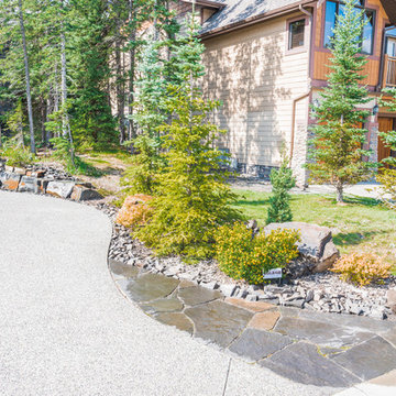 Driveway with Flagstone Feature & Rock Retaining Wall