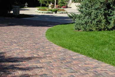 Photo of a large full sun stone landscaping in Minneapolis.