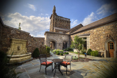 Example of a classic patio design in Other