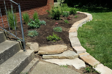 This is an example of a medium sized front garden in Columbus.