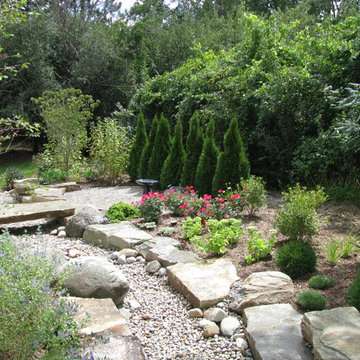 Dry Stream Bed with Stone Bridge and Planting Bed