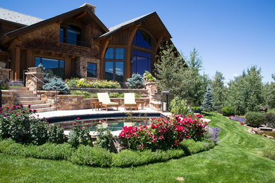 Inspiration for a traditional full sun backyard landscaping in Denver for summer.