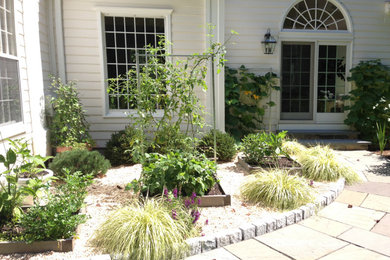 Inspiration for a contemporary full sun backyard raised garden bed in New York.