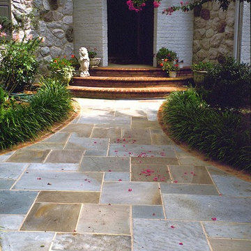 Elegant Stone Entry with Brick Border and Steps