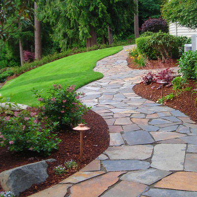 Inspiration for a traditional side yard landscaping in Seattle.