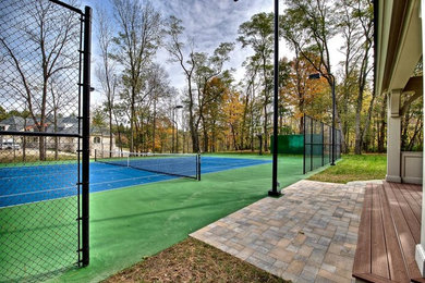 Inspiration for a large traditional full sun backyard brick outdoor sport court in Indianapolis for summer.