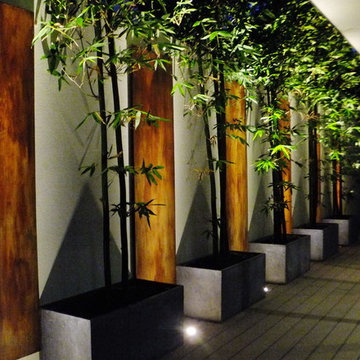 example of Asian design to cover boring wall, New York Plantings Garden Designer