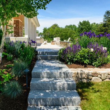 Exquisite stonewalls, granite steps, walkways, and beautiful gardens