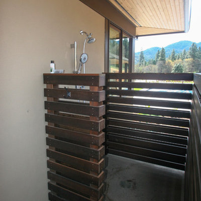 This is an example of a mid-sized transitional shade backyard landscaping in Other.