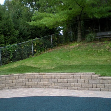 Finished Retaing Wall and Paver Boarder with New Sod