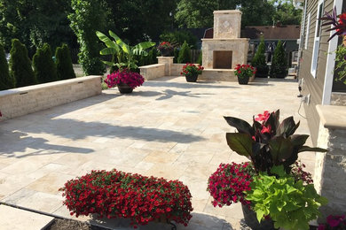 This is an example of a stone landscaping in Cincinnati with a fire pit.