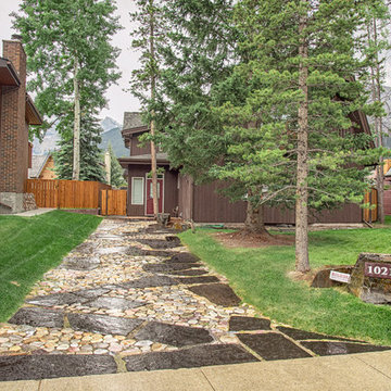 Flagstone Driveway With River Rock