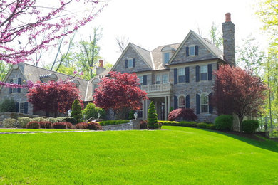 Design ideas for a traditional full sun front yard formal garden in Philadelphia for spring.