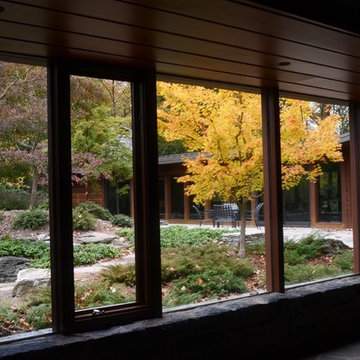 Frank Lloyd Wright inspired garden living brings views to each window.