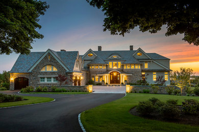 Inspiration for a large traditional partial sun front yard concrete paver driveway in Providence for summer.