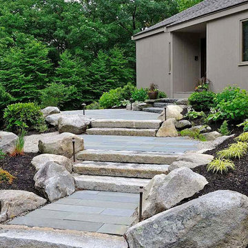 Front entrance renovation with reclaimed granite steps and bluestone landings.