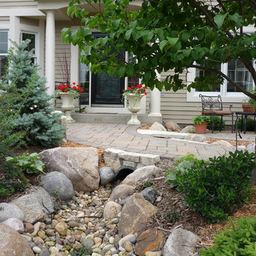 Front Paver Sidewalk with Sitting Area and Dry Stream