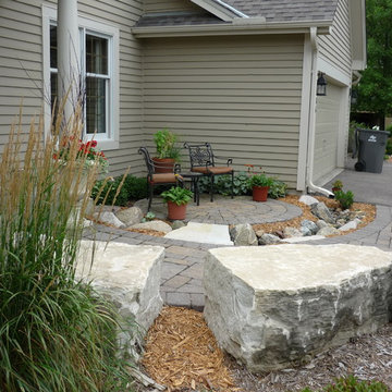 Front Paver Sidewalk with Sitting Area and Dry Stream