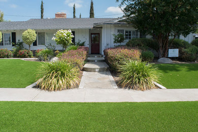 Inspiration for a large traditional drought-tolerant and partial sun front yard garden path in Orange County for summer.