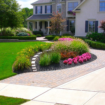 Front yard with landscaping and retaining walls